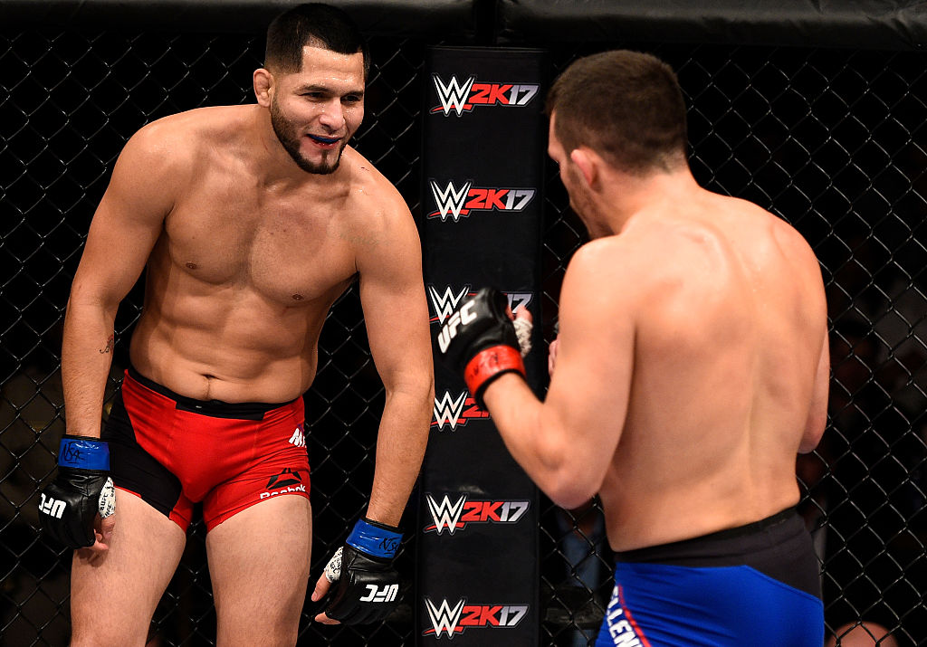 ATLANTA, GA - JULY 30: Jorge Masvidal (top) punches Ross Pearson in their welterweight bout during the UFC 201 event at Philips Arena. (Photo by Jeff Bottari/Zuffa LLC)