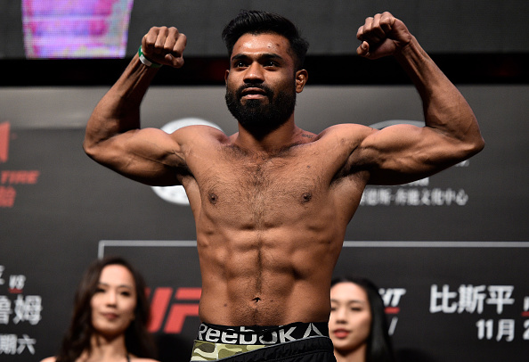 SHANGHAI, CHINA - NOVEMBER 24: <a href='../fighter/Bharat-Kandare'>Bharat Kandare</a> of India poses on the scale during the <a href='../event/UFC-Silva-vs-Irvin'>UFC Fight Night </a>weigh-in on November 24, 2017 in Shanghai, China. (Photo by Brandon Magnus/Zuffa LLC via Getty Images)“ align=“center“/><br />There’s no question that fight fans in India were watching intently in September as Arjan Bhullar, the first fighter of Indian descent to compete in the UFC, made his Octagon debut with a win over <a href=