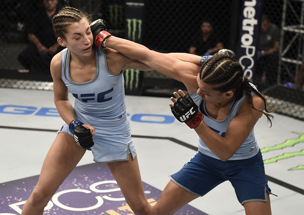 Nicco Montano punches Montana Stewart during the quarterfinals of The Ultimate Fighter