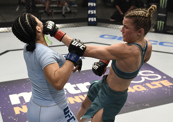 Barb Honchak cpunches Rachael Ostovich-Berdon during the quarterfinals of The Ultimate Fighter