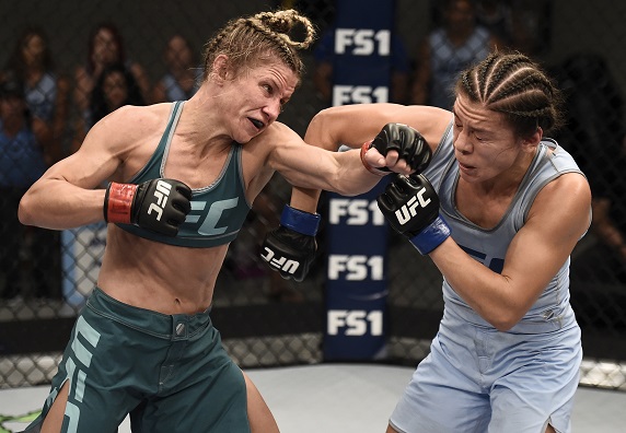 Barb Honchak punches Montano during their semifinal bout at The Ultimate Fighter