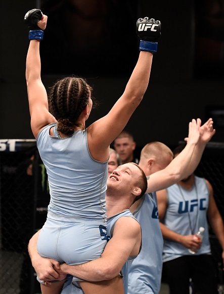 Nicco Montano celebrates after defeating Barb Honchak in their semifinal matchup