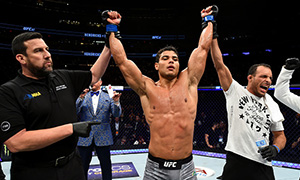 Paulo Costa of Brazil celebrates his victory over <a href='../fighter/Johny-Hendricks'>Johny Hendricks</a> in their middleweight bout during the UFC 217 event at Madison Square Garden on November 4, 2017 in New York City. (Photo by Josh Hedges/Zuffa LLC)“ align=“left“/>It takes more than winning at the UFC level to reach superstar status. A fighter has to win in a certain way, and, as superficial as it may sound, looks and charisma do play a part. But at the moment, middleweight Paulo Costa may have all the tools to become the next big star out of Brazil. Throughout his Saturday bout with Johny Hendricks, some guy behind press row kept screaming for “Bigg Rigg” to “knock the Calvin Klein model out.” That didn’t happen, as Costa scored a one-sided second round stoppage of the former welterweight champion. But the point is this: if he’s getting that much of a reaction in his third UFC fight, that’s something you don’t normally see. Beating Hendricks was a big deal, but if he gets his wish for a fight with top contender <a href=