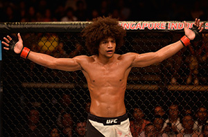 Alex Caceres reacts to the doctor stoppage for <a href='../fighter/Rolando-Dy'>Rolando Dy</a> of the Philippines in their featherweight bout during the UFC Fight Night event at the Singapore Indoor Stadium on June 17, 2017 in Singapore. (Photo by Brandon Magnus/Zuffa LLC)“ align=“left“/>One of China’s top fighters makes his UFC debut this weekend as Wang Guan takes on Alex Caceres in battle at 145 pounds.</p><p>With a 19-1-1 record, Wang is a very experienced fighter who has earned 14 career knockouts, which means he’s got no fear when it comes to swinging heavy leather with any of his opponents. So there’s little doubt that he’s going to be gunning for the finish on the feet, especially while facing a fighter like Caceres, who is very slick on the ground.</p><p>It’s tough to figure out which version of Caceres will show up when he steps into the Octagon. There are moments where he looks like a future title contender and others where he puts on a baffling performance that just doesn’t add up when the fight is over. That being said, Caceres has faced a laundry list of top fighters throughout his career and that experience will help him a ton against a fighter like Wang, who hasn’t taken on top competition like that throughout his career.</p><p>Caceres just has to be wary of the power Wang possesses, but as long as he can stay out of range of those powerful hands, he should be able to employ a smart striking strategy and even mix in a couple of takedowns to keep his opponent guessing. Of course, the hype around Guan could be for real and it’s possible that he pulls off the shocking win, but the smart pick remains with Caceres based on Octagon experience against the best of the best throughout his career.</p><p><em>Prediction: Alex Caceres by unanimous decision</em></p><p><strong>Muslim Salikhov vs. Alex Garcia</strong></p><p>Speaking of hyped prospects, Muslim Salikhov will make his highly anticipated debut this weekend against Alex Garcia in a welterweight matchup.</p><p>Salikhov has gained a reputation around the world as one of the most vicious knockout artists in the game, with a creative arsenal that would even make <a href=