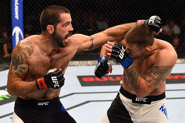 Matt Brown punches <a href='../fighter/Tim-Means'>Tim Means</a> in their welterweight fight during the UFC 189 event inside MGM Grand Garden Arena on July 11, 2015 in Las Vegas, Nevada. (Photo by Josh Hedges/Zuffa LLC)“ align=“center“/>Matt Brown will attempt to cap off his career with a win against Diego Sanchez on Saturday night in what should be an absolute slugfest between two of the most exciting fighters in the history of the UFC.</p><p>Brown enters the fight after dropping his last three in a row, but he’s also faced some stiff competition during that time. Meanwhile, Sanchez is moving back up to welterweight, where he’s found a lot of success during his career, although he will definitely be giving up some size and power to the larger fighter in Brown.</p><p>For Brown to win this fight he has to use that size and reach to slow Sanchez down. Sanchez loves constant movement with a lot of footwork and punches thrown in blistering combinations. Brown prefers to slow things down a bit by using his punching power to then get inside and batter an opponent with knees and elbows from the clinch. The last place Sanchez can afford to be in this fight is with Brown pressing him against the cage, unloading a barrage of strikes that he can’t escape.</p><p>The same could be said for Brown just chasing Sanchez and eating punches from the smaller, yet faster, fighter. Sanchez is very good at baiting an opponent to step forward, and then he’ll unleash a furious series of punches that often do a lot of damage.</p><p>All that said, Brown knows this may be his swan song and every fighter wants to go out on a win. If he can pressure Sanchez early with that devastating clinch game, he should be able to close out his career with yet another knockout. Make no mistake, Sanchez is as tough as they come, but he’s suffered a couple knockouts in recent fights at lightweight and Brown hits much harder at 170 pounds. That all adds up to the favorite – Brown – to get the job done.</p><p><em>Prediction: Matt Brown by TKO, Round 2</em></p><p><strong>Joe Lauzon vs. Clay Guida</strong></p><p><img class=