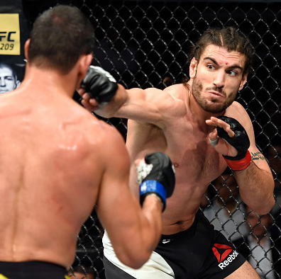 Elias Theodorou of Canada punches Cezar Ferreira of Brazil in their middleweight fight during the UFC Fight Night event inside the Scotiabank Centre on February 19, 2017 in Halifax, Nova Scotia, Canada. (Photo by Josh Hedges/Zuffa LLC)