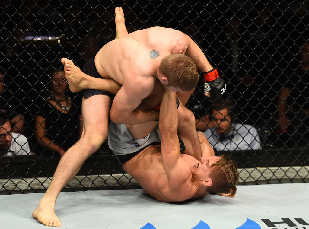 Jake Matthews punches Bojan Velickovic during their welterweight bout at Fight Night Sydney