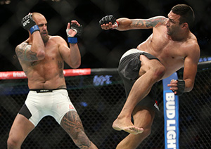 Fabricio Werdum kicks <a href='../fighter/Travis-Browne'>Travis Browne</a> during the UFC 203 event at Quicken Loans Arena on September 10, 2016 in Cleveland, Ohio. (Photo by Rey Del Rio/Getty Images)“ align=“left“/> victories, including a second-round stoppage win over Hunt to claim the interim heavyweight title and a third-round submission finish over <a href=