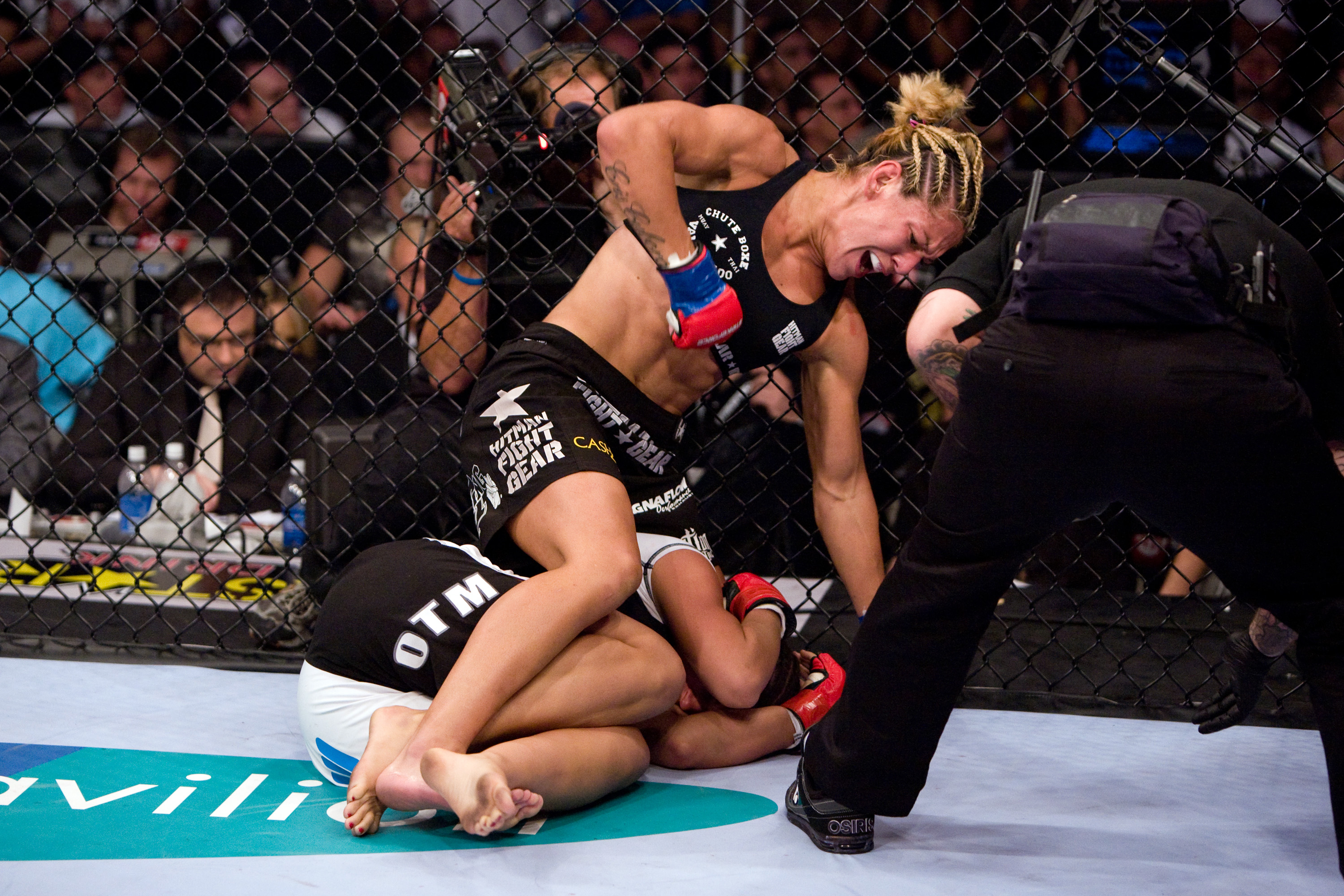 MELBOURNE, AUSTRALIA - NOV. 15: (L-R) Holly Holm lands a left-high kick against Ronda Rousey in the second round of their UFC women's bantamweight championship bout during the UFC 193 event at Etihad Stadium. (Photo by Josh Hedges/Zuffa LLC)