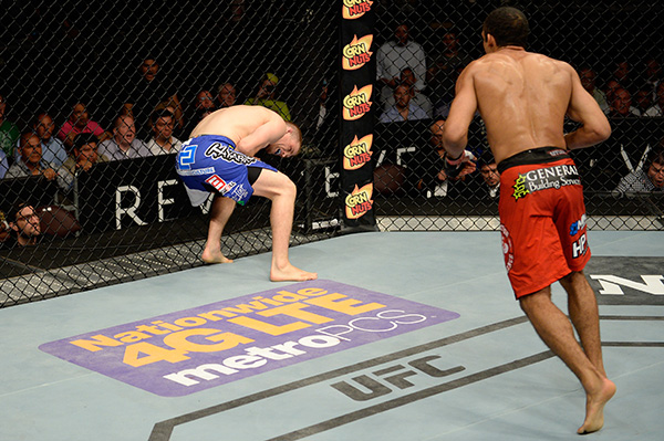 Edson Barboza looks to strike after kicking the body of Evan Dunahm in their lightweight bout during the UFC Fight Night event at Revel Casino on July 16, 2014 in Atlantic City, New Jersey. (Photo by Jeff Bottari/Zuffa LLC)