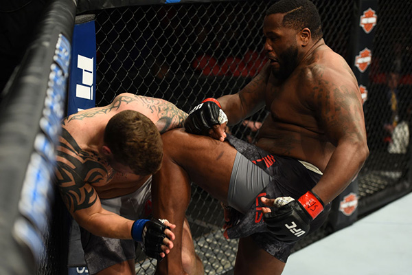 (R-L) <a href='../fighter/Justin-Willis'>Justin Willis</a> lands a knee to the body of <a href='../fighter/Allen-Crowder'>Allen Crowder</a> in their heavyweight bout during the UFC 218 event inside Little Caesars Arena on December 02, 2017 in Detroit, Michigan. (Photo by Josh Hedges/Zuffa LLC)“ align=“center“/> Heavyweight prospect Justin Willis made it two for two in the opener, halting Dana White’s Tuesday Night Contender Series alum Allen Crowder in the first round.</p><p>Crowder tried to get his offense in gear early, but Willis had an answer for everything, landing hard shots throughout. Midway through the frame, a left hook rattled Crowder, and moments later, another left hook ended matters, with referee Dan Miragliotta stepping in at 2:33 of the opening round.</p><p>San Jose’ Willis moves to 6-1; Crowder falls to 9-3 with 1 NC.</p></div><footer><div class=