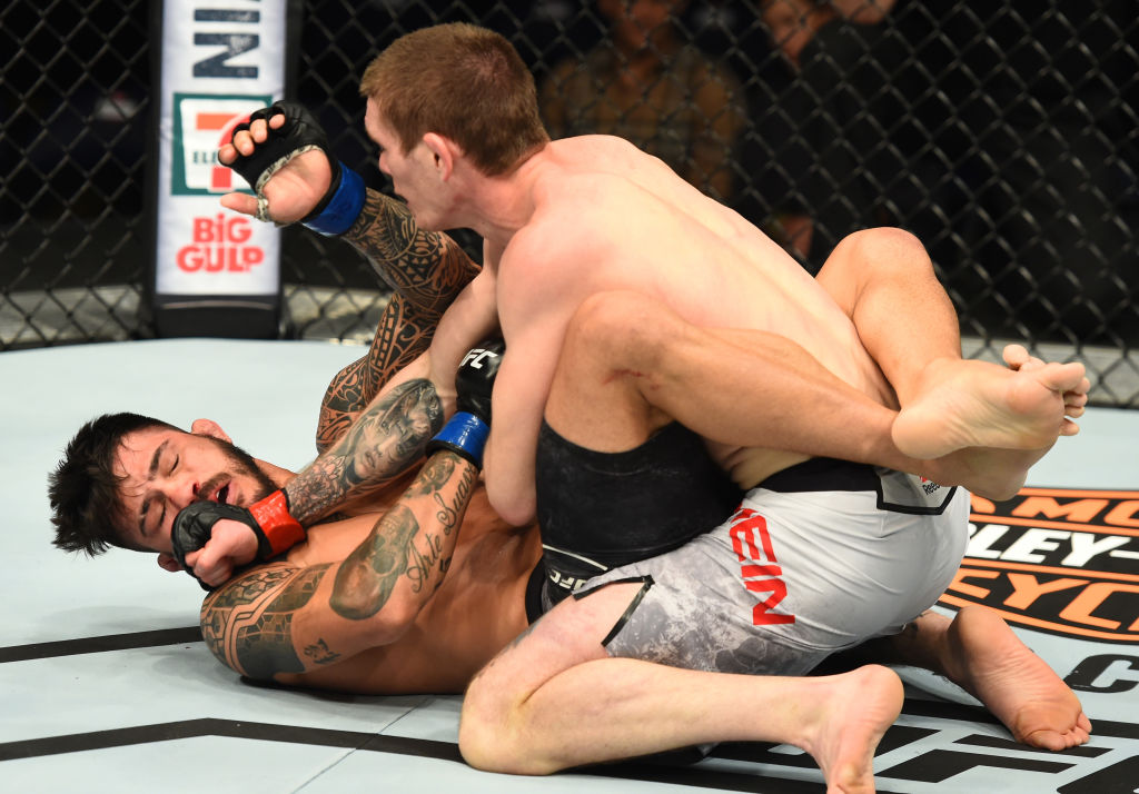 WINNIPEG, CANADA - DECEMBER 16: Jordan Mein of Canada (top) punches Erick Silva of Brazil in their welterweight bout during the UFC Fight Night event at Bell MTS Place on December 16, 2017 in Winnipeg, Manitoba, Canada. (Photo by Josh Hedges/Zuffa LLC)