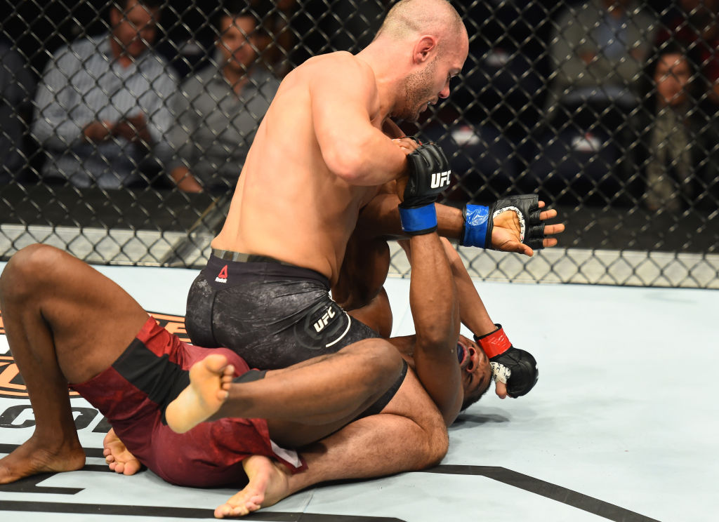 WINNIPEG, CANADA - DECEMBER 16: Chad Laprise of Canada (top) punches Galore Bofando of Congo in their welterweight bout during the UFC Fight Night event at Bell MTS Place on December 16, 2017 in Winnipeg, Manitoba, Canada. (Photo by Josh Hedges/Zuffa LLC)