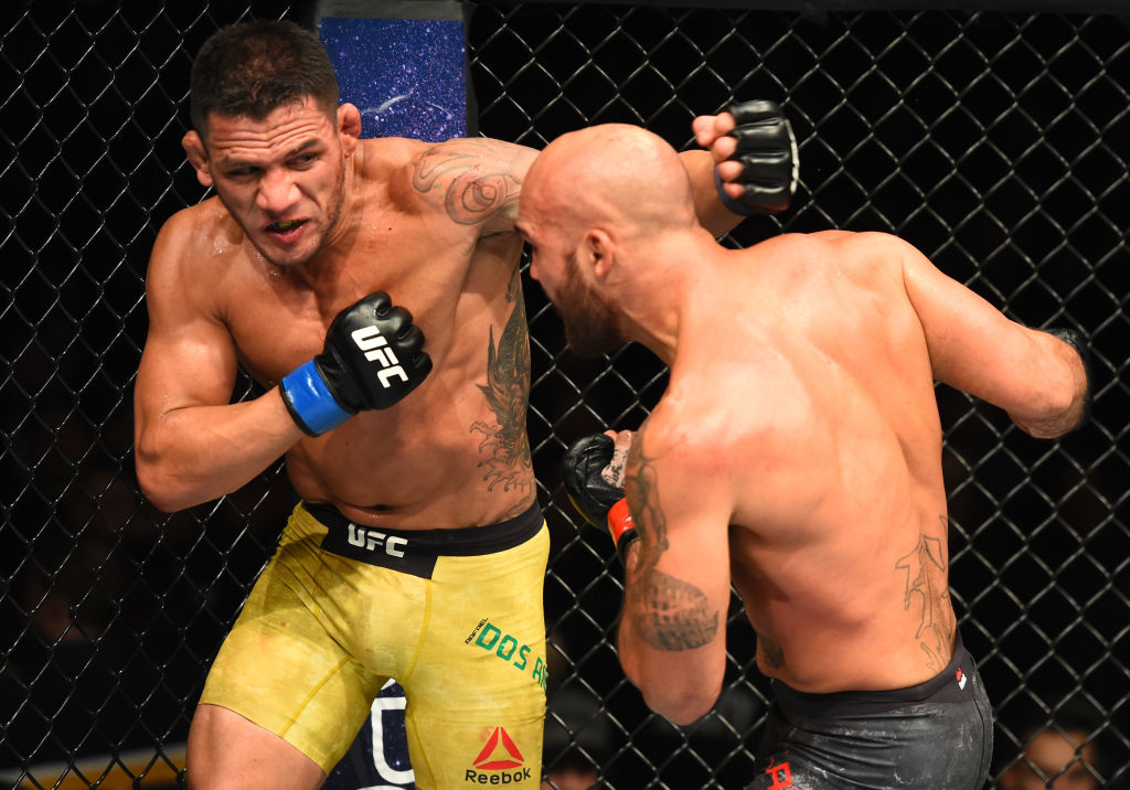 WINNIPEG, CANADA - DECEMBER 16: (L-R) Rafael Dos Anjos of Brazil punches Robbie Lawler in their welterweight bout during the UFC Fight Night event at Bell MTS Place on December 16, 2017 in Winnipeg, Manitoba, Canada. (Photo by Josh Hedges/Zuffa LLC)