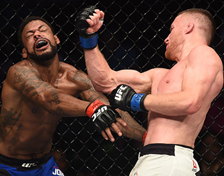 Justin Gaethje punches Michael Johnson during <a href='../event/The-Ultimate-Fighter-T-Rampage-vs-T-Forrest-Finale'><a href='../event/The-Ultimate-Fighter-Finale-Team-Nog-vs-Team-Mir'><a href='../event/The-Ultimate-Fighter-Team-Liddell-vs-Team-Ortiz-FINALE'><a href='../event/TUF13-finale'><a href='../event/the-ultimate-fighter-a-champion-will-be-crowned'>The Ultimate Fighter Finale </a></a></a></a></a>at T-Mobile Arena on July 7, 2017 in Las Vegas, Nevada. (Photo by Brandon Magnus/Zuffa LLC)“ align=“right“/> “When I watched it, I still can’t,” Gaethje says, pausing to find the right word as he recalls the early summer Pier Six brawl that has to be the clubhouse leader in the Fight of the Year discussion at this point. “I’ll never understand why I didn’t go to sleep on that left hand that he landed. I don’t get it.”</p><p>When he says “that left hand that he landed,” there are myriad options to choose from. It might be the one that backed him up a couple steps right out of the chute. Maybe it’s the two-piece that put him on the canvas momentarily towards the end of the first.</p><p>The most likely shot, however, is the short counter that landed flush and turned Gaethje into a baby deer taking its first steps in the center of the Octagon 80 seconds into the second round. Even after watching the fight back countless times and knowing what transpires, it’s still difficult to fathom that Gaethje not only stays upright, but rallies to finish the contest before the round is over.</p><p>But then again, that’s just what the unbeaten Arizona native does.</p><p>A big part of what had everyone in the mixed martial arts community excited about his arrival on the biggest stage in the sport is that Gaethje had spent the previous three years turning in savage performances under the World Series of Fighting banner, amassing 10 straight victories with his unrelenting, forward pressure and devil may care offensive approach.</p><p>When he landed in the UFC, the 29-year-old former Division I All-American wrestler from the University of Northern Colorado lobbied to face the toughest opponent available and admitted that his high-risk style was going to lead to him getting knocked out in vicious fashion somewhere down the line, but he had no intention of changing his approach.</p><p>Somehow, his debut still managed to exceed the hype and now his sophomore appearance comes against <a href=