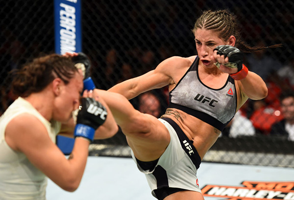 <a href='../fighter/Tecia-Torres'>Tecia Torres</a> kicks <a href='../fighter/michelle-waterson'>Michelle Waterson</a> in their women’s strawweight bout during the UFC 218 event inside Little Caesars Arena on December 02, 2017 in Detroit, Michigan. (Photo by Josh Hedges/Zuffa LLC)“ align=“center“/> Tecia Torres’ third consecutive win was one of the most important of her career, as the strawweight contender opened up the main card with a unanimous decision victory over Michelle Waterson.</p><p>Scores were 30-27 and 29-28 twice.</p><p>Waterson struck first in the fight with a shot that opened up a cut under Torres’ right eye, but from there, it was “The Tiny Tornado” in control, as she implemented a busy attack that kept Waterson guessing.</p><p>Waterson scored a takedown in the second minute of round two and did well from the top position for a while, but Torres stayed busy, working for a kimura and a triangle choke from her back before they rose in the closing seconds of the frame.</p><p>With her left eye bruised up, Waterson had something else to deal with in the third round and Torres capitalized, using her strikes to set up a takedown. Once on the mat, Torres took over with hard strikes that nearly halted the fight, but the gutsy New Mexico product was able to escape just before the end of the bout.</p><p>The No. 5-ranked Torres moves to 10-1 with the win. The No. 6-ranked Waterson falls to 14-6.</p></div></div></div><div class=