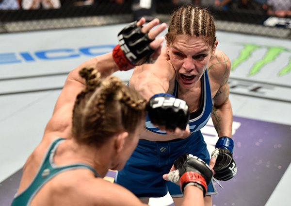 Lauren Murphy punches Barb Honchak in their women's flyweight bout during the TUF Finale event inside Park Theater on December 01, 2017 in Las Vegas, Nevada. (Photo by Jeff Bottari/Zuffa LLC)