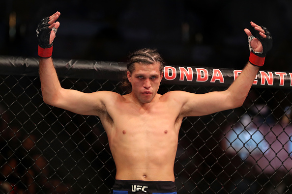 Brian Ortega acknowledges the fans during his fight at UFC 214 against Renato Moicano