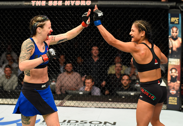 (L-R) <a href='../fighter/Joanne-Calderwood'>Joanne Calderwood</a> and Cynthia Calvillo high five during the <a href='../event/UFC-Silva-vs-Irvin'>UFC Fight Night </a>event at the SSE Hydro Arena Glasgow on July 16, 2017 in Glasgow, Scotland. (Photo by Josh Hedges/Zuffa LLC)“ align=“right“/> Strawweight contender Cynthia Calvillo still has a fight against former world champion <a href=