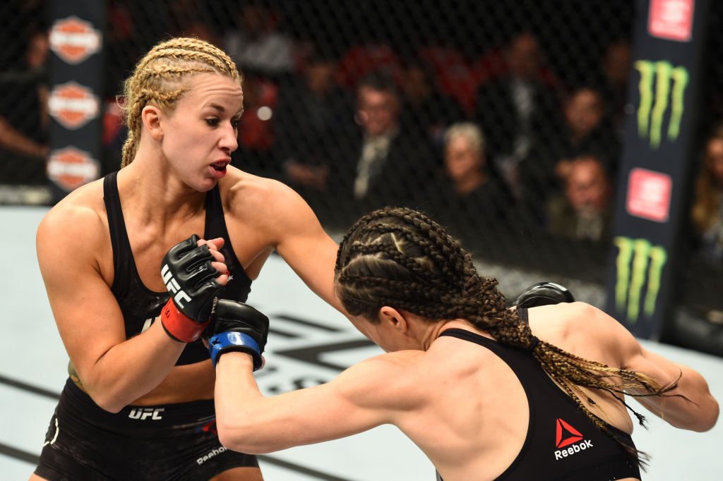 DETROIT, MI - DECEMBER 02: (L-R) Amanda Cooper punches Angela Magana in their women's strawweight bout during the UFC 218 event inside Little Caesars Arena on December 02, 2017 in Detroit, Michigan. (Photo by Josh Hedges/Zuffa LLC)