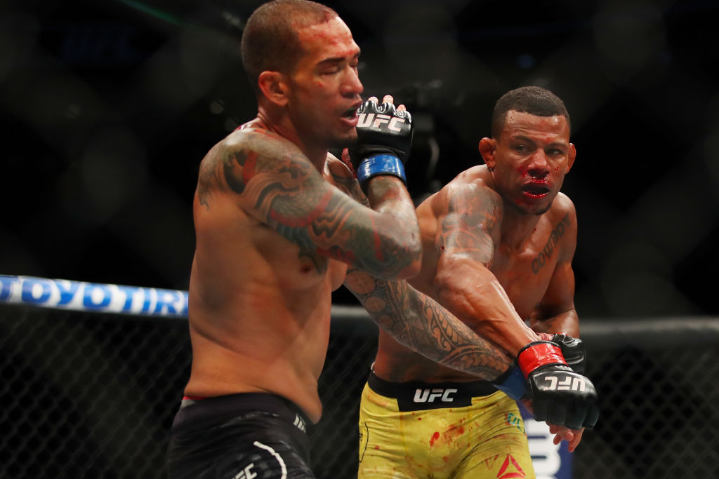 Yancy Medeiros (L) battles Alex Oliveira (R) during UFC 218 at Little Ceasars Arena on December 2, 2018 in Detroit, Michigan. (Photo by Gregory Shamus/Getty Images)