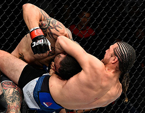 (R-L) Brian Ortega attempts to submit Cub Swanson in their featherweight bout during the UFC Fight Night event on Dec. 9, 2017 in Fresno, CA. (Photo by Jeff Bottari/Zuffa LLC)