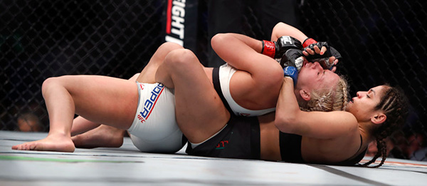 <a href='../fighter/cynthia-calvillo'>Cynthia Calvillo</a> (R) wrestles with <a href='../fighter/amanda-cooper'>Amanda Cooper</a> during UFC 209 on March 4, 2017 in Las Vegas, NV. (Photo by Steve Marcus/Getty Images)“ align=“center“/> The last time we checked in with Cynthia Calvillo, just before her July bout against <a href=