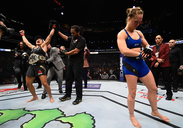 Nunes attempts to take down <a href='../fighter/Miesha-Tate'><a href='../fighter/Miesha-Tate'>Miesha Tate</a></a> during their title fight at UFC 200″ align=“middle“/><br />When <a href=