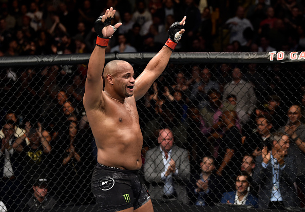 BOSTON, MA - JANUARY 20: Daniel Cormier celebrates after his TKO victory over Volkan Oezdemir of Switzerland in their light heavyweight championship bout during the UFC 220 event at TD Garden on January 20, 2018 in Boston, Massachusetts. (Photo by Jeff Bottari/Zuffa LLC/Zuffa LLC via Getty Images)