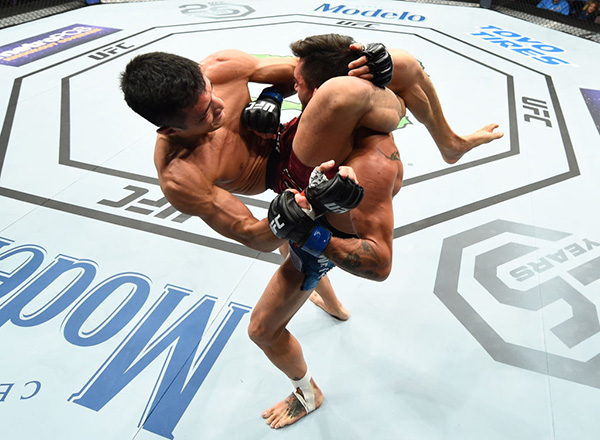 ST. LOUIS, MO - JANUARY 14: (L-R) Kyung Ho Kang of South Korea attempts to submit Guido Cannetti of Argentina in their bantamweight bout during the UFC Fight Night event inside the Scottrade Center on January 14, 2018 in St. Louis, Missouri. (Photo by Josh Hedges/Zuffa LLC)