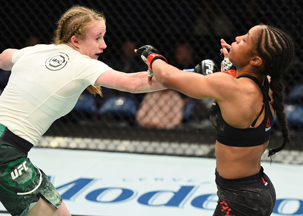 ST. LOUIS, MO - JANUARY 14: (L-R) JJ Aldrich punches Danielle Taylor in their women's strawweight bout during the UFC Fight Night event inside the Scottrade Center on January 14, 2018 in St. Louis, Missouri. (Photo by Josh Hedges/Zuffa LLC)