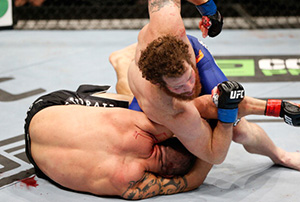 (R-L) Nate Marquardt elbows <a href='../fighter/James-Te-Huna'>James Te Huna</a> in their middleweight fight during the UFC Fight Night event at Vector Arena on June 28, 2014 in Auckland, New Zealand. (Photo by Josh Hedges/Zuffa LLC)“ align=“left“/>But many of his greatest early moments didn’t take place in an Octagon, but in a ring. In fact, he was barely out of his teens when he made his Pancrase debut in Japan against none other than the legendary <a href=