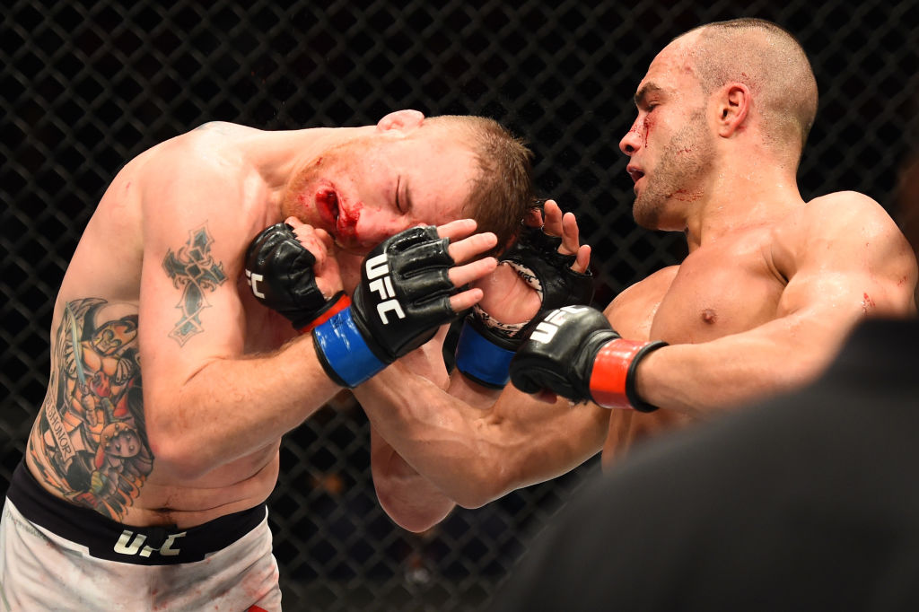 Eddie Alvarez punches Justin Gaethje during UFC 218 on December 02, 2017 in Detroit, Michigan. (Photo by Josh Hedges/Zuffa LLC)