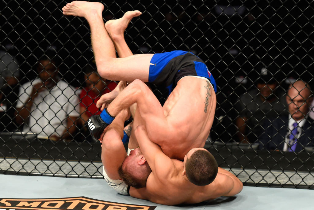 Louis Smolka controls the body of Tim Elliott during the UFC Fight Night event on April 15, 2017 in Kansas City, Missouri. (Photo by Josh Hedges/Zuffa LLC)