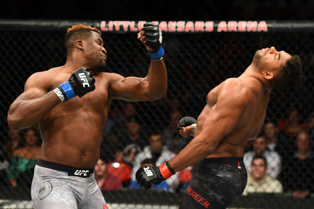 (L-R) Francis Ngannou of punches Alistair Overeem UFC 218 on December 02, 2017 in Detroit, MI (Photo by Josh Hedges/Zuffa LLC)