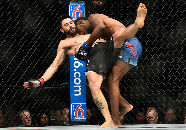 LAS VEGAS, NV - DECEMBER 30: (R-L) Neil Magny takes down Carlos Condit in their welterweight bout during the UFC 219 event inside T-Mobile Arena on December 30, 2017 in Las Vegas, Nevada. (Photo by Brandon Magnus/Zuffa LLC)
