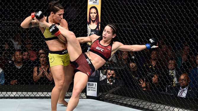 ORLANDO, FL - FEB. 24: (L-R) Jessica Andrade of Brazil takes down Tecia Torres in their women's strawweight bout during the UFC Fight Night event at Amway Center. (Photo by Jeff Bottari/Zuffa LLC)