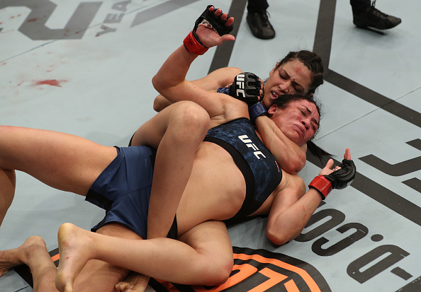 BELEM, BRAZIL - FEBRUARY 03: (L-R) Polyana Viana of Brazil submits Maia Stevenson in their women's strawweight bout during the UFC Fight Night event at Mangueirinho Arena on February 03, 2018 in Belem, Brazil. (Photo by Buda Mendes/Zuffa LLC/Zuffa LLC via Getty Images)