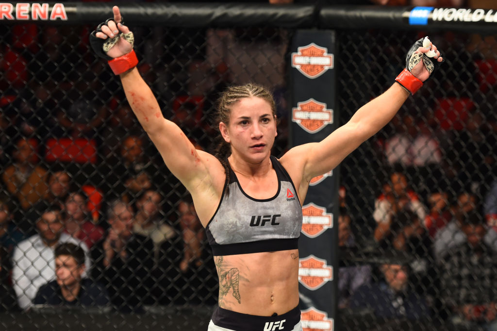 DETROIT, MI - DECEMBER 02: Tecia Torres reacts after finishing three rounds against <a href='../fighter/michelle-waterson'>Michelle Waterson</a> in their women’s strawweight bout during the UFC 218 event inside Little Caesars Arena on December 02, 2017 in Detroit, Michigan. (Photo by Josh Hedges/Zuffa LLC/Zuffa LLC via Getty Images)“ align=“center“/><br />Another trick Torres has up her sleeve is her toughness. It’s not something that’s first on her list of attributes when it comes to the public, but she’s undoubtedly proven her grit over the years.<p>“I’m a tough chick and I’ve been in there with the best of the best, sometimes even more than once,” she said. “People have their opinions, and I’m not too much in the limelight like some of the girls in the division, but I definitely believe I’m top five for a reason and I’ve been top five since I’ve been in the UFC for a reason. It’s my time to make a bigger statement and I think with each fight I’m getting closer and closer.”</p><p>A championship belt around her waist wouldn’t be a bad statement to make, and if her fiancé, bantamweight contender <a href=