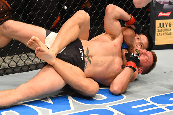 AUCKLAND, NEW ZEALAND - JUNE 11: (R-L) Ben Nguyen submits Tim Elliott in their flyweight fight during the UFC Fight Night event at the Spark Arena on June 11, 2017 in Auckland, New Zealand. (Photo by Josh Hedges/Zuffa LLC/Zuffa LLC via Getty Images)