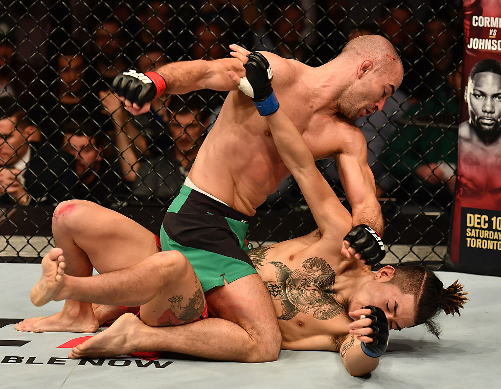 Artem Lobov punches Teruto Ishihara on November 19, 2016 in Belfast, Northern Ireland. (Photo by Brandon Magnus/Zuffa LLC)