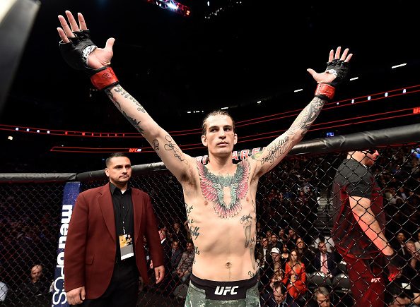 LAS VEGAS, NV - MARCH 03: <a href='../fighter/Sean-O-Malley'>Sean O’Malley</a> prepares to fight Andre Soukhamthath in their bantamweight bout during the UFC 222 event inside T-Mobile Arena on March 3, 2018 in Las Vegas, Nevada. (Photo by Jeff Bottari/Zuffa LLC/Zuffa LLC via Getty Images)“ align=“center“/><br />A kick by O’Malley hurt Soukhamthath’s left leg early in the fight, but the Rhode Island native walked it off and got back to business, scoring with a right. O’Malley continued to play the role of aggressor, though, scoring with a variety of blows from all angles. With 42 seconds left, a right by O’Malley dropped Soukhamthath, and while the veteran got back to his feet, he was clearly dazed, with a left kick to the head before the horn rocking him again.<p>Soukhamthath came out throwing hard to begin round two, eager to get back into the fight. O’Malley kept tagging him, though, prompting a takedown by Soukhamthath. O’Malley was unbothered by the change of location, as he sunk in a triangle choke and then an armbar. Soukhamthath pulled free from both and got into side control with two minutes left, but O’Malley escaped and briefly grabbed a guillotine choke and rear naked choke before the end of the round.</p><p>O’Malley hurt himself with a kick early in the final frame, and Soukhamthath used that moment to get the fight back to the mat with plenty of time left on the clock. As the two rose with under two minutes left, O’Malley couldn’t put any weight on this right foot, and the fight went to the canvas once more. Soukhamthath controlled matters from there, with O’Malley clearly in pain but able to make it to the end of the fight.</p><p>With the win, O’Malley moves to 10-0. Soukhamthath falls to 12-6.</p><p><strong>ARLOVSKI vs STRUVE</strong></p><p>Former UFC heavyweight champion <a href=