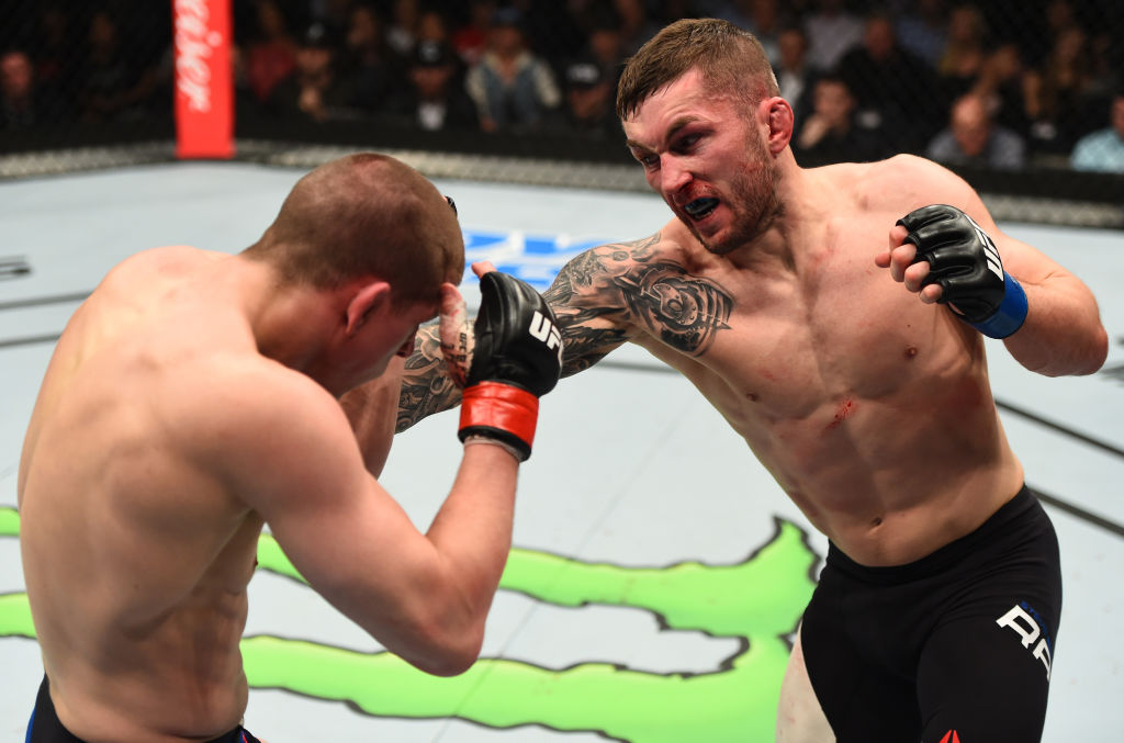 NASHVILLE, TN - APRIL 22: (R-L) Stevie Ray of Scotland punches Joe Lauzon in their lightweight bout during the UFC Fight Night event at Bridgestone Arena on April 22, 2017 in Nashville, Tennessee. (Photo by Jeff Bottari/Zuffa LLC/Zuffa LLC via Getty Images) 