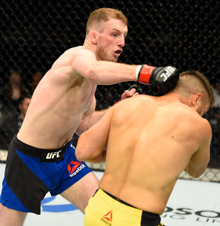 Henry punches Teymur during the UFC Fight Night on July 16, 2017 in Glasgow, Scotland. (Photo by Josh Hedges/Zuffa LLC)