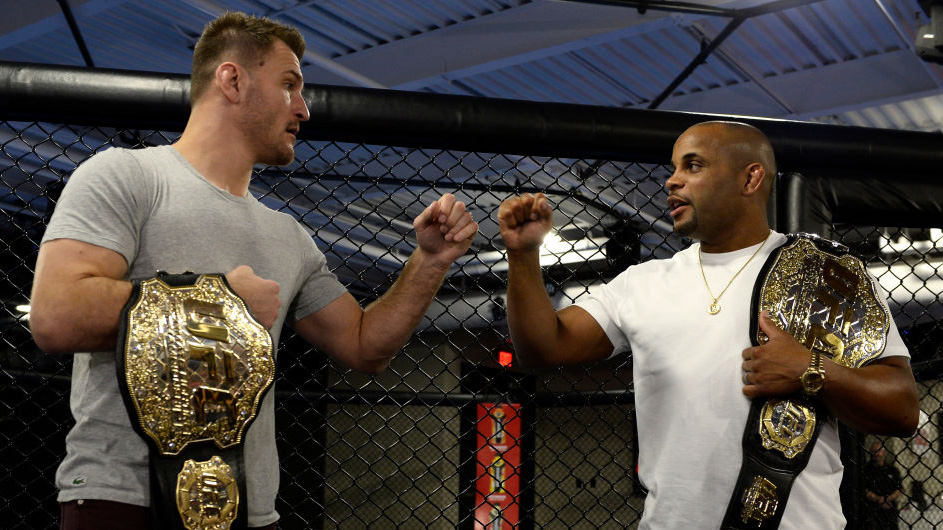 Stipe Miocic and Daniel Cormier bump fists during the The Ultimate Fighter: Undefeated Cast & Coaches Media Day in Las Vegas, NV. (Photo by Brandon Magnus/Zuffa LLC)