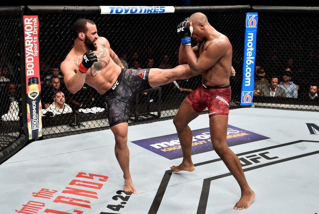  Devin Clark kicks Mike Rodriguez in their light heavyweight bout during the UFC 223 event inside Barclays Center on April 7, 2018 in Brooklyn, New York. (Photo by Jeff Bottari/Zuffa LLC)