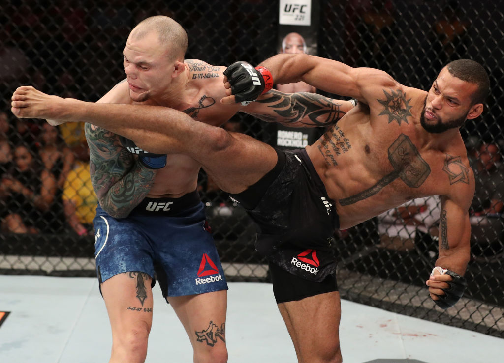 BELEM, BRAZIL - FEBRUARY 03: (R-L) Thiago Santos of Brazil kicks Anthony Smith in their middleweight bout during the UFC Fight Night event at Mangueirinho Arena on February 03, 2018 in Belem, Brazil. (Photo by Buda Mendes/Zuffa LLC/Zuffa LLC via Getty Images)