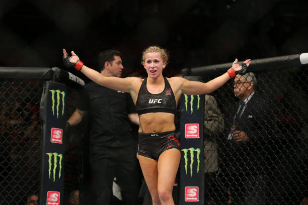 DETROIT, MI - DECEMBER 2: <a href='../fighter/amanda-cooper'>Amanda Cooper</a> celebrates her bout against <a href='../fighter/Angela-Magana'>Angela Magana</a> during the UFC 218 event at Little Caesars Arena on December 2, 2017 in Detroit, Michigan. (Photo by Rey Del Rio/Zuffa LLC via Getty Images)“ align=“center“/><br />Given the fact that Amanda Cooper has been competing in combat sports since her pre-teen years, the Michigan native had come to grips with a few fight game certainties. Training was hard. Winning was good. Losing was bad. But between her March 2017 loss to <a href=