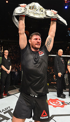 Bisping celebrates his victory over Dan Henderson at UFC 204 (Photo by Josh Hedges/Zuffa LLC)