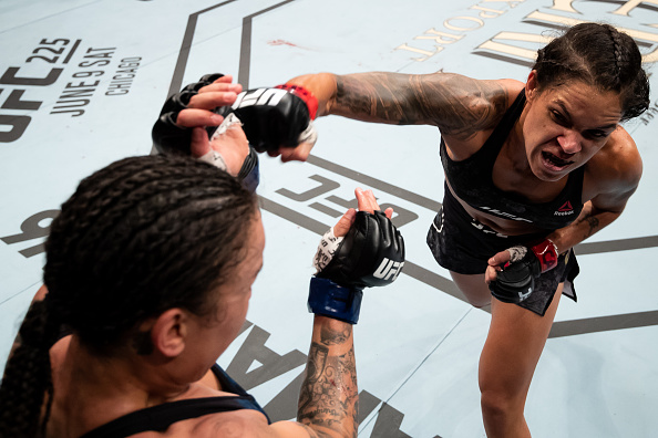 RIO DE JANEIRO, BRAZIL - MAY 12: Amanda Nunes ( R) of Brazil punches Raquel Pennington of the United States in their women's bantamweight bout during the UFC 224 event at Jeunesse Arena on May 12, 2018 in Rio de Janeiro, Brazil. (Photo by Buda Mendes/Zuffa LLC/Zuffa LLC)